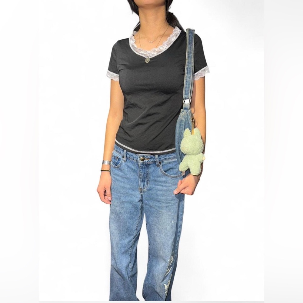 Y2K Black lace trimmed top with a charm design.